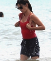 penelope-cruz-seen-wearing-a-red-top-and-black-shorts-while-enjoying-a-day-out-on-the-beach-in-fregene-italy-200721_8.jpg