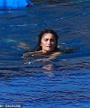 4769362-6240905-Just_keep_swimming_Penelope_swam_around_in_the_swimming_pool_whi-a-18_1538682741814.jpg