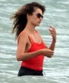 penelope-cruz-seen-wearing-a-red-top-and-black-shorts-while-enjoying-a-day-out-on-the-beach-in-fregene-italy-200721_3.jpg