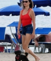 penelope-cruz-seen-wearing-a-red-top-and-black-shorts-while-enjoying-a-day-out-on-the-beach-in-fregene-italy-200721_9.jpg